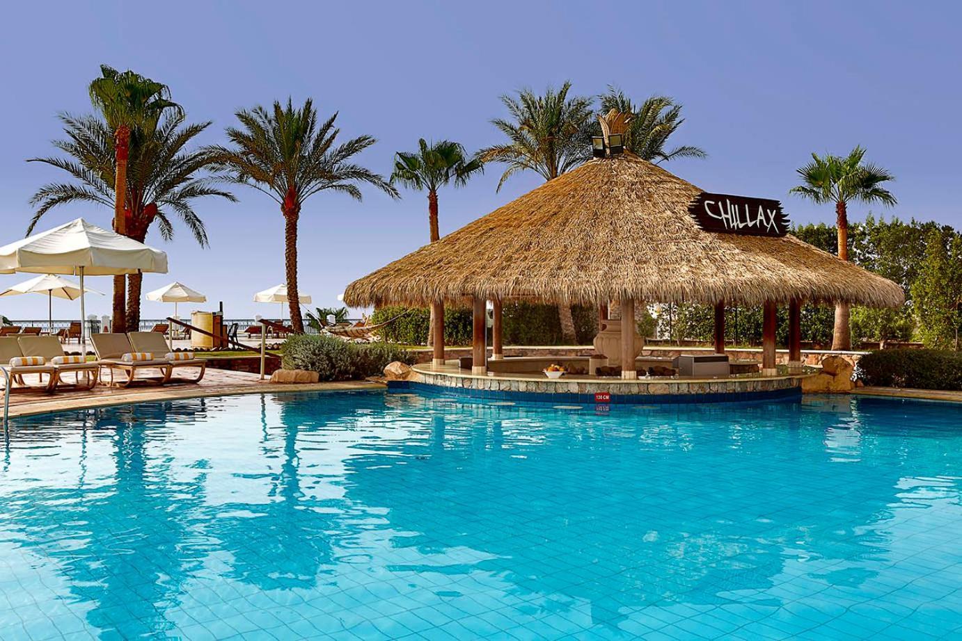 Safir Sharm Waterfalls Resort 外观 照片 The pool at the Hilton Sharm El Sheikh